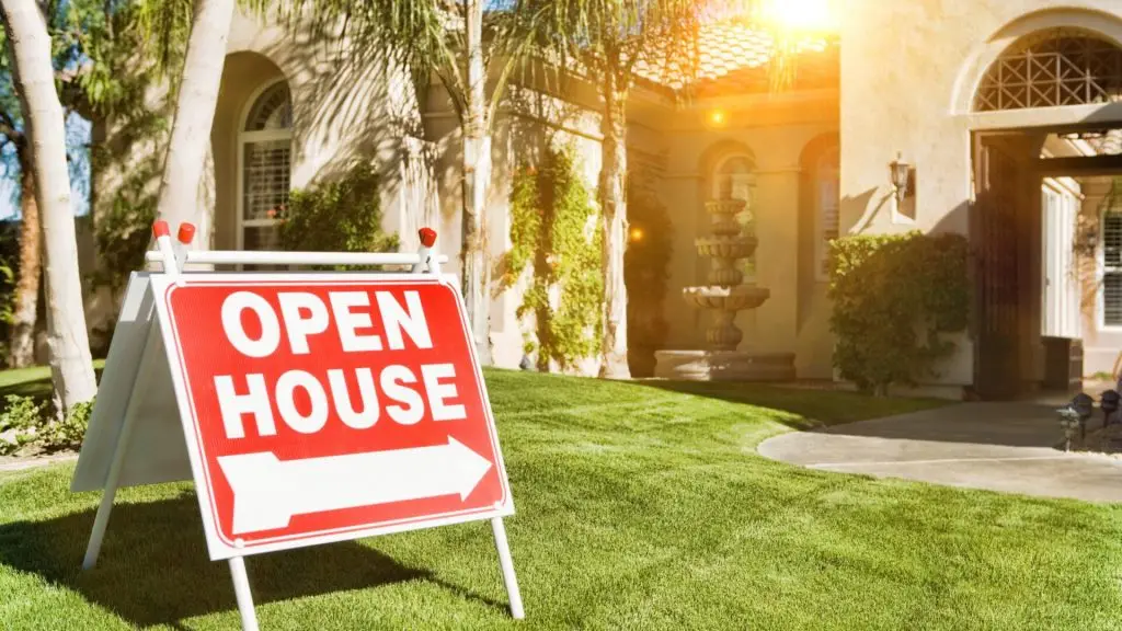 open house sign in front of house