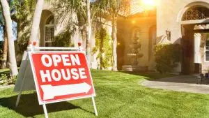 open house sign in front of house