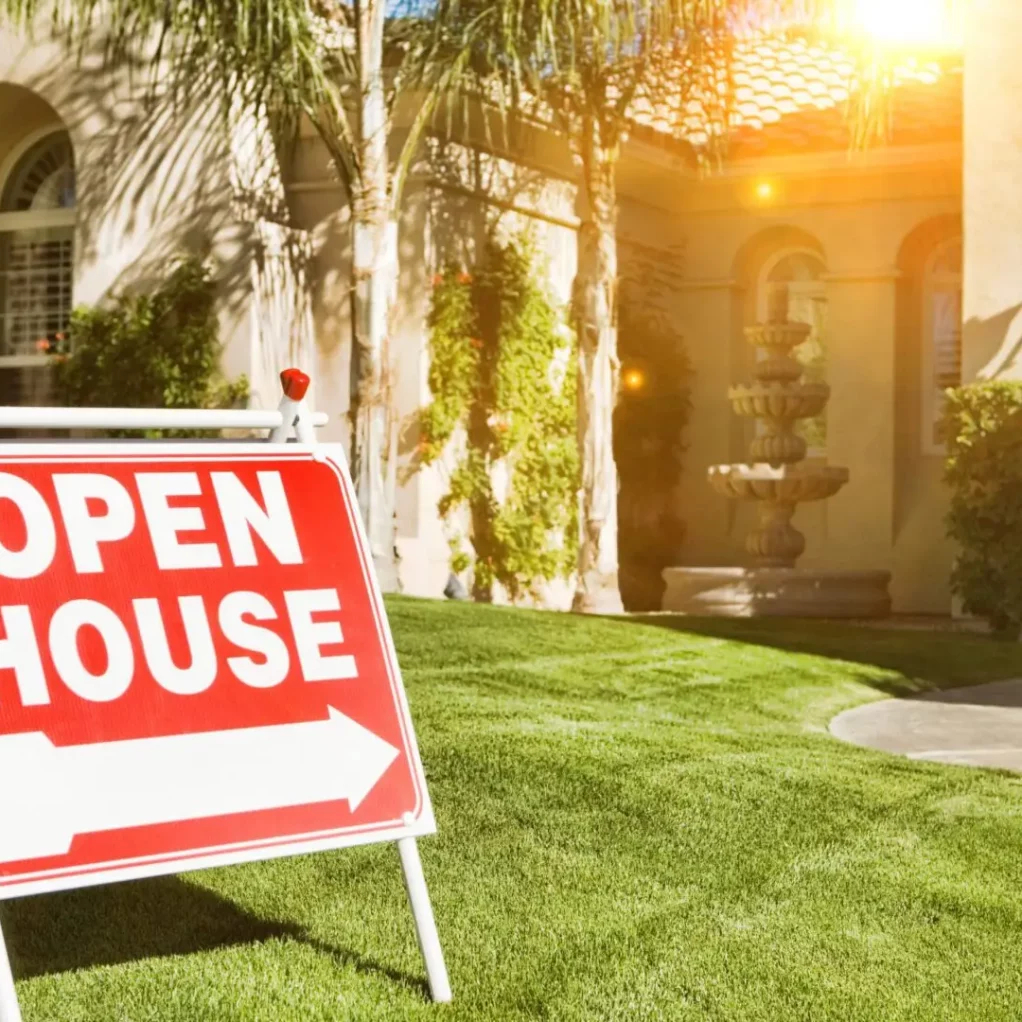 open house sign in front of house